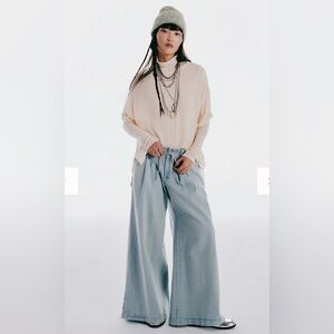 Cream Sweater and Light Blue Wide-Leg Jeans